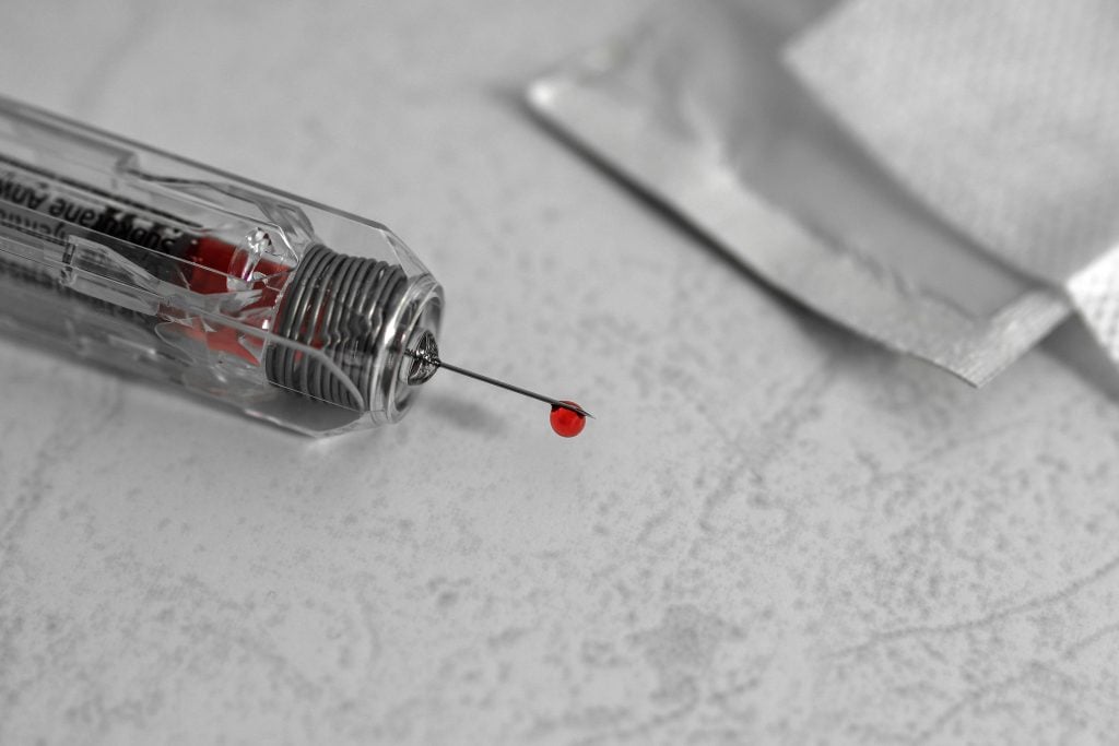 picture of syringe with blood